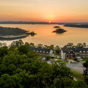 A stay at Lakeview Lodge in Beavers Bend State Park is perfect for catching Oklahoma sunsets paint the rolling hills surrounding Broken Bow Lake in golden shades of orange and purple.  Photo by Shane Bevel.