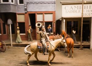 The Oklahoma Road Trip Team explores Route 66 in Claremore, hitting popular attractions like the Will Rogers Memorial Museum and a totem pole park before heading to Hammett House Restaurant to try the chicken fried steak and thick pies.