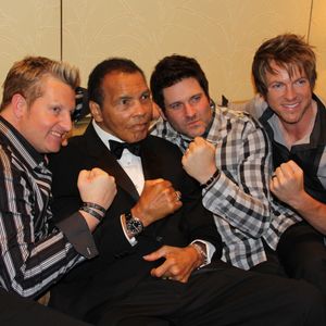 Rascal Flatts pose with Muhammad Ali in 2012