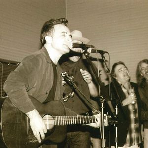 Michael Fracasso, John Cooper, Greg Johnson and Bob Childers performing at the Woody Guthrie tribute concert at The Blue Door in the late 1990's