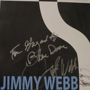 Jimmy Webb and John Fullbright poster on the wall at The Blue Door