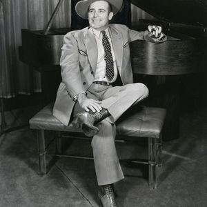 A band leader, fiddler and songwriter, Bob Wills mastered and popularized western swing.