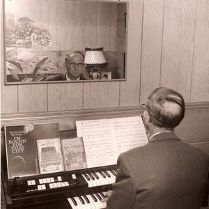 Albert Brumley at the organ in the late 1950's