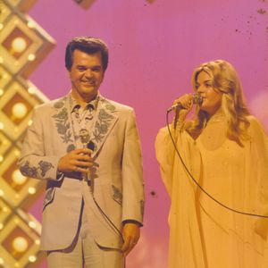 Conway Twitty and his daughter Joni performing "Don't Cry Joni" during the 1975 CMA Awards Show.