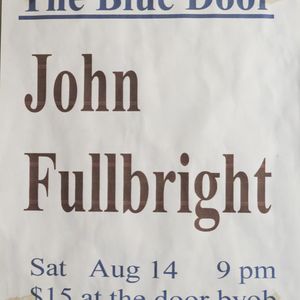 John Fullbright flyer on the wall at The Blue Door