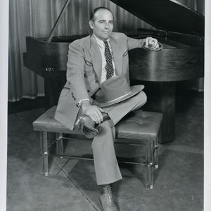 Bob Wills became popular with hits like "Take Me Back to Tulsa" and "San Antonio Rose."