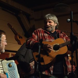 Tom Skinner performs at the Blue Door's annual Woody Guthrie Tribute show in 2010 with TZ Wright on accordion (left), Don Morris and John Fullbright.