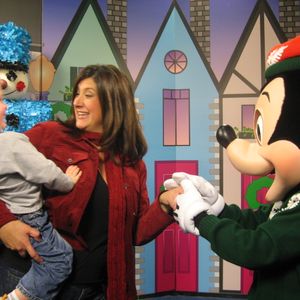 Kellie Coffey in San Diego at a TV station promoting the Disney Castle lighting show with her son meeting Mickey Mouse for the first time