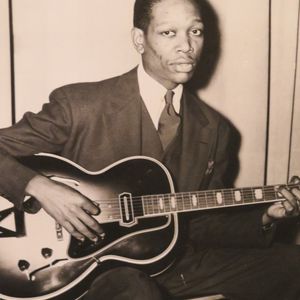 Charlie Christian portrait on the wall at The Blue Door