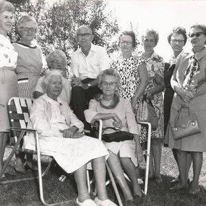 Albert Brumley and his wife Goldie pose with several folks at the Hill & Hollow Folk Festival, which Albert started on his land in Missouri