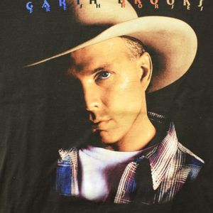 A concert shirt on display at the Yukon Historical Society is just one piece of merchandise popular among Garth Brooks fans.
