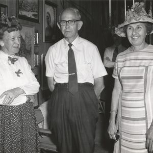 Albert poses with two ladies