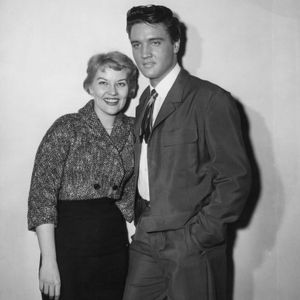 Patti Page with Elvis Presley pause for a photo on the set of "King Creole."