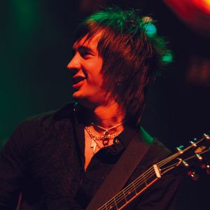 All-American Rejects lead guitarist Nick Wheeler plays with the band at a live show. 