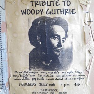 Woody Guthrie poster on the entryway wall of The Blue Door