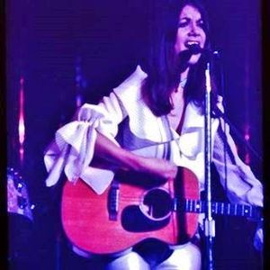 Jody sings and plays her vintage Martin tenor guitar as she performs in England in 1971.