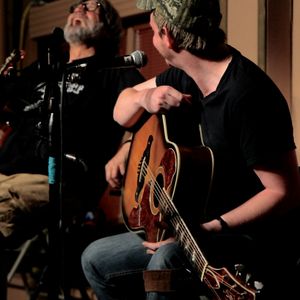 Tom Skinner performing at The Blue Door with John Fullbright in 2014