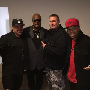 Color Me Badd pose with Stevie Wonder