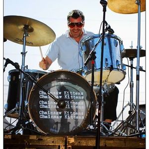 Drummer Eric Harmon performing with the Chainsaw Kittens at the first annual Norman Music Festival in 2008