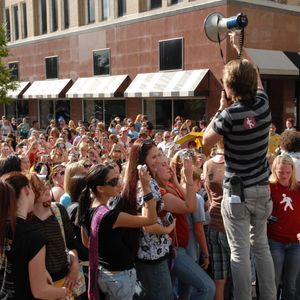 The three Tulsa brothers who make up the band Hanson return to their hometown often. Here they lead a walk for charity in 2007.