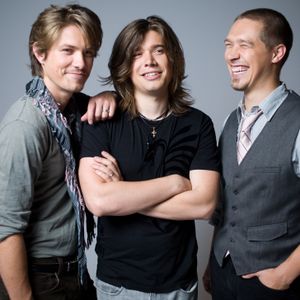 The Hanson brothers smile for promotional photos in a 2007 photo shoot in Tulsa. 