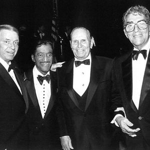Oklahoma native Gene Autry poses for a photo with the Rat Pack - Frank Sinatra, Sammy Davis, Jr. and Dean Martin.