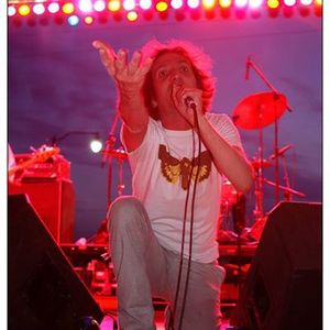 Tyson Meade reaches out to fans at a Chainsaw Kittens performance 