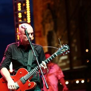 Trent Bell playing guitar during the Chainsaw Kittens performance at the first annual Norman Music Festival in 2008