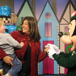 Kellie Coffey in San Diego at a TV station promoting the Disney Castle lighting show with her son meeting Mickey Mouse for the first time