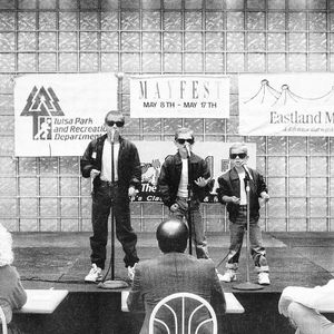 Hanson performing at Eastland Mall as part of Tulsa's International Mayfest in 1992.