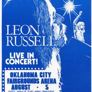 A poster advertises a Leon Russell performance at the Oklahoma City Fairgrounds Arena.