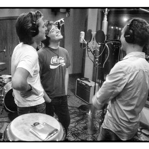 The Hanson brothers sing together in their Tulsa recording studio, 3CG, which is short for Three Car Garage, in 2006.