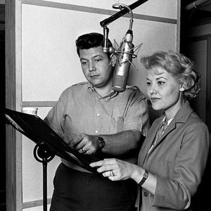Patti Page works on an album in a recording studio.