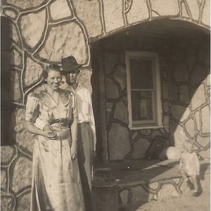 Albert Brumley and his wife Goldie pose in front of their Missouri home in the early 1930's