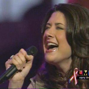 Kellie Coffey pictured singing at the Grand Ole Opry on CMT's "Opry Live" in 2002