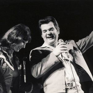 Conway Twitty performs live with Loretta Lynn.