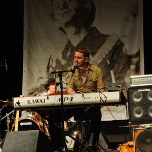 John Fullbright performing on the main stage at his first WoodyFest in Okemah, Oklahoma in 2012