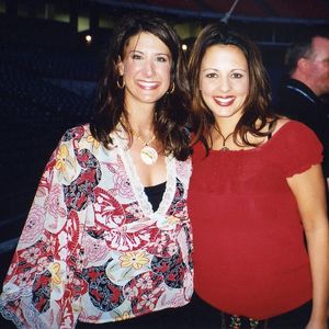 Kellie Coffey pictured with Sara Evans backstage at the Adelphia Coliseum at Nashville's 2002 Fan Fare country music festival 