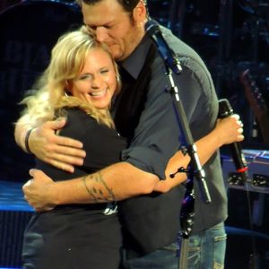 Blake Shelton embraces ex-wife Miranda Lambert after a live performance for the Healing in the Heartland concert at Chesapeake Energy Arena in Oklahoma City.