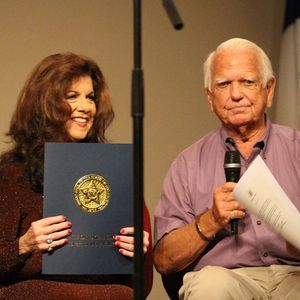 Jody is presented with Governor Mary Fallin's proclamation by former Oklahoma Governor, George Nigh at the "Jody Miller Day Show" on July 29,2016, in Blanchard, Oklahoma.