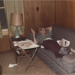 Albert Brumley relaxes on a sofa in this 1972 photo