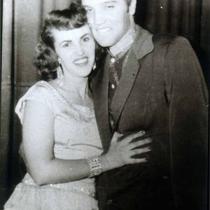 Wanda Jackson smiles for a photo with Elvis Presley. 