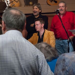 Tom Skinner onstage with John Fullbright and Joe Baxter at the 2014 Woody Guthrie Tribute at the Blue Door.