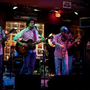 John Fullbright (far right) playing accordion with the Turnpike Troubadours at Eskimo Joes in Stillwater, Oklahoma in 2009