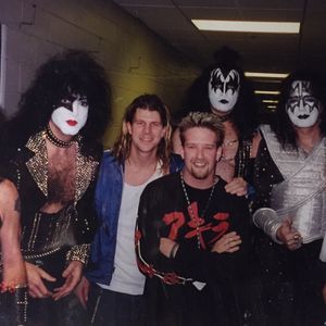 The Nixons pose for a photo with Kiss backstage at Boston's Fleet Center in July, 1996