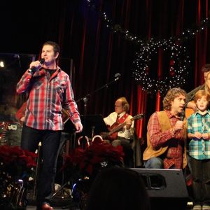 Glenn Sulley and Marty Summers are joined on stage by young performers to wish everyone a Merry Christmas at the Oklahoma Opry in December 2012.