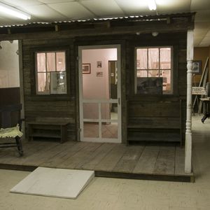 A replica of the London House, where Woody Guthrie spent his youth, was built using the original wood from the home. 