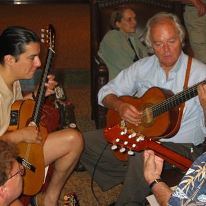 Mason Williams playing guitar with Edgar Cruz at a 2003 Chet Atkins Appreciation Society event in Nashville, TN