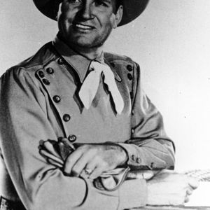 Gene Autry won over fans with his sweet smile and charming cowboy persona. 
