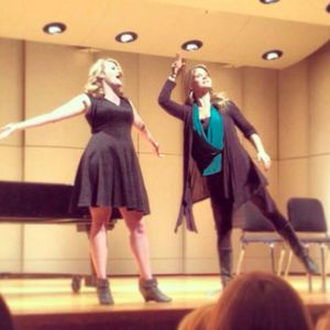 Kelli O'Hara, (right) works with students during a master class at Oklahoma City University in November 2013.